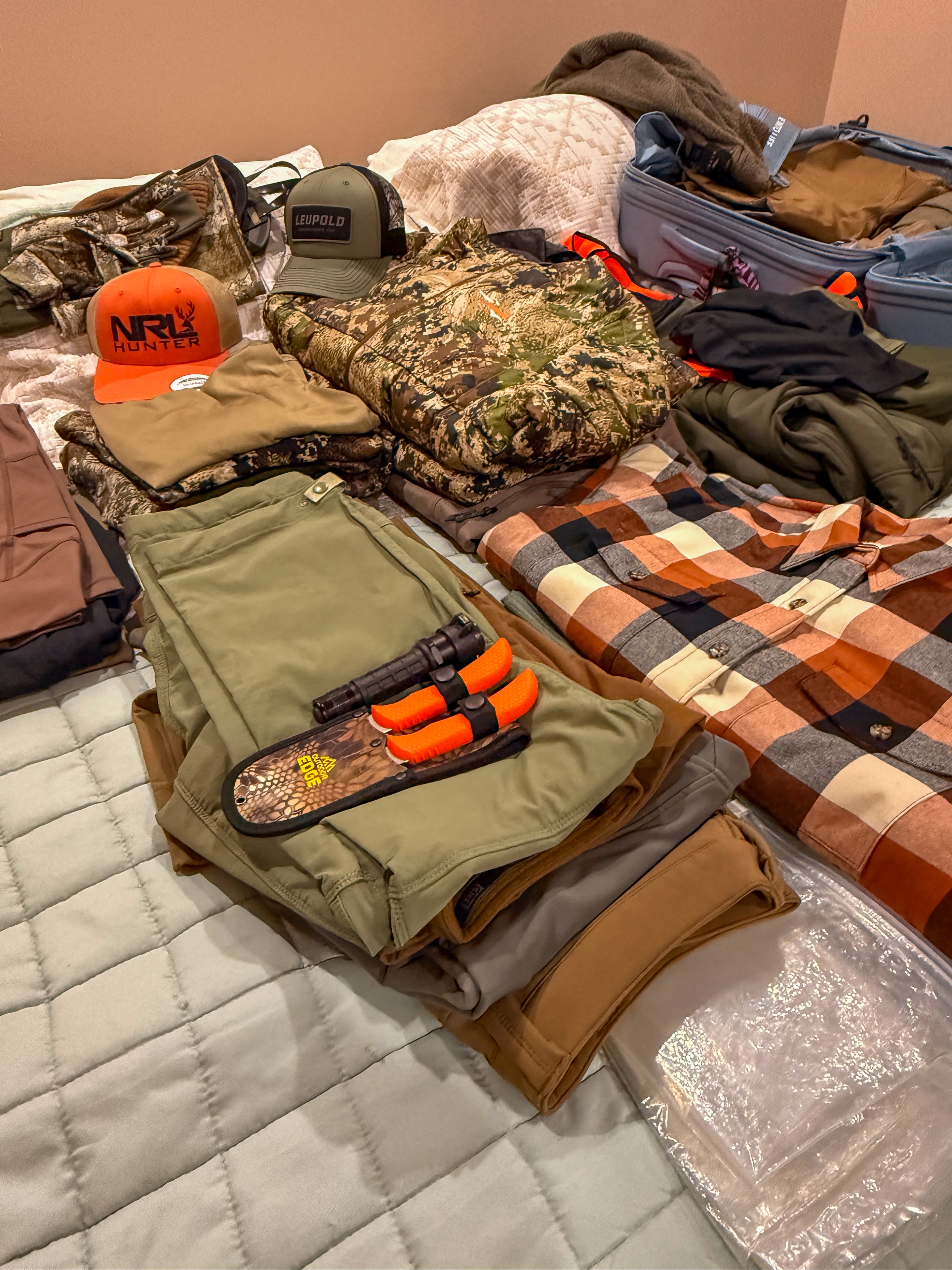 Hunting equipment laid out before a trip, capturing the preparation that precedes every hunt